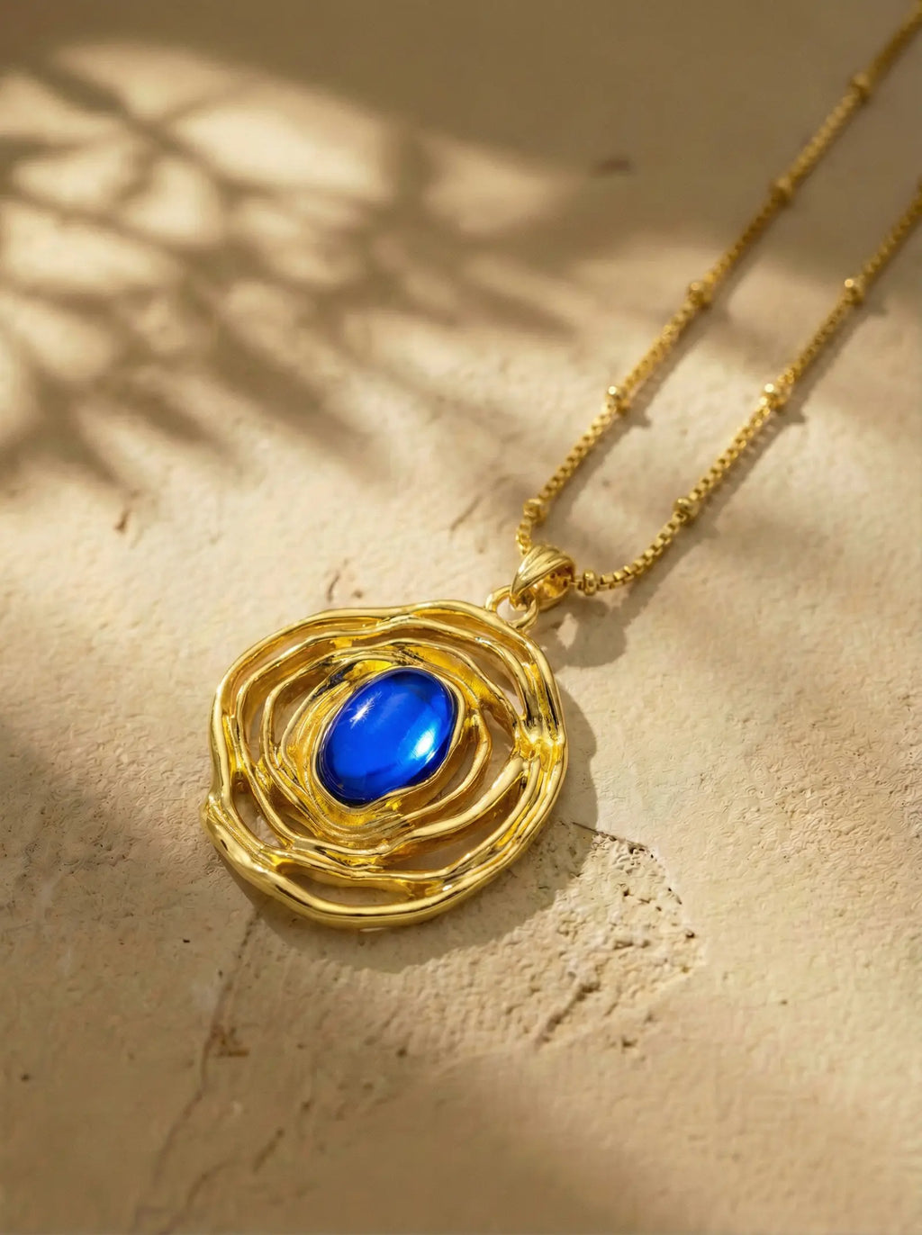 Vintage Gold Nest Necklace with Royal Blue Stone