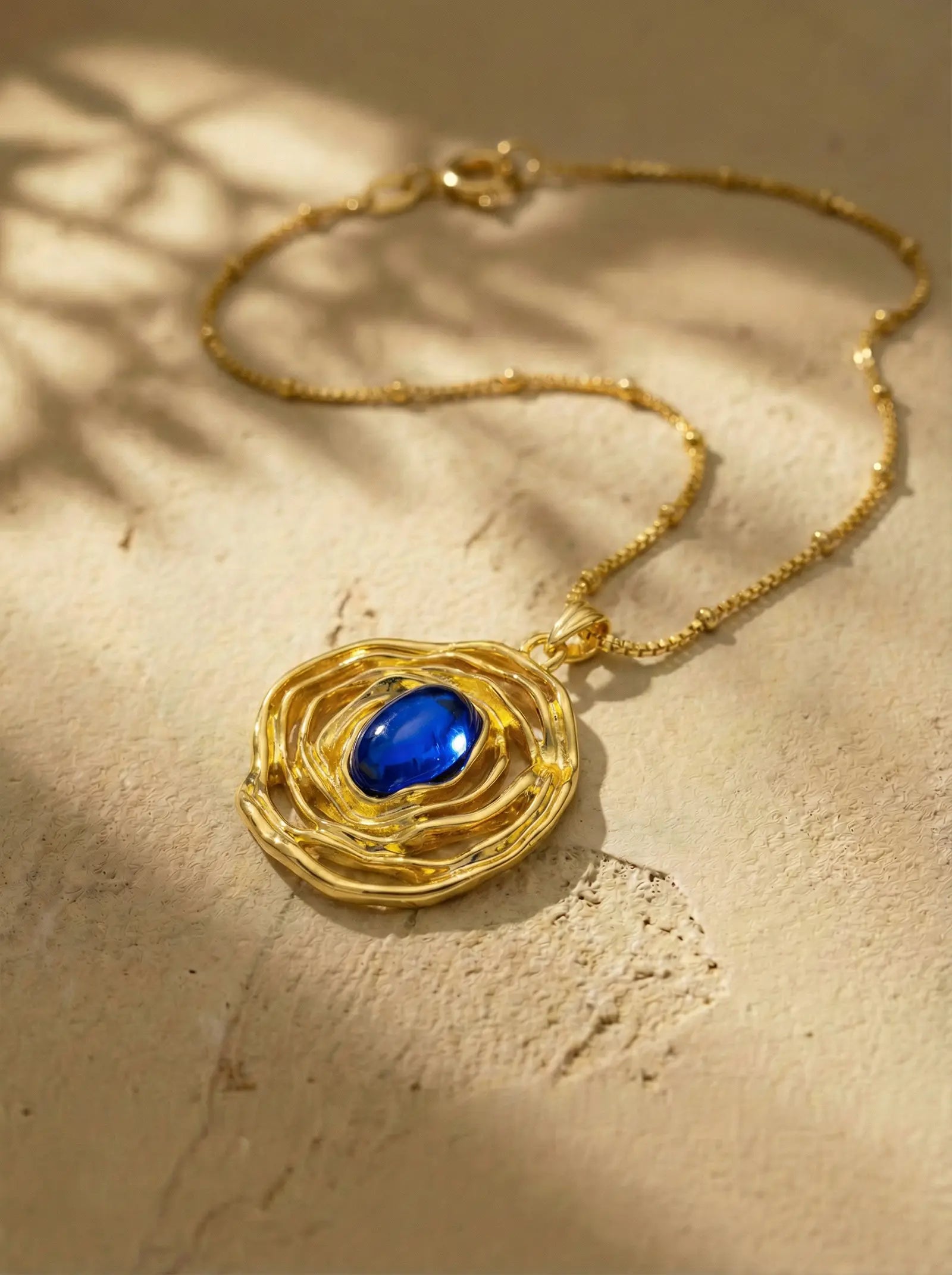 Vintage Gold Nest Necklace with Royal Blue Stone